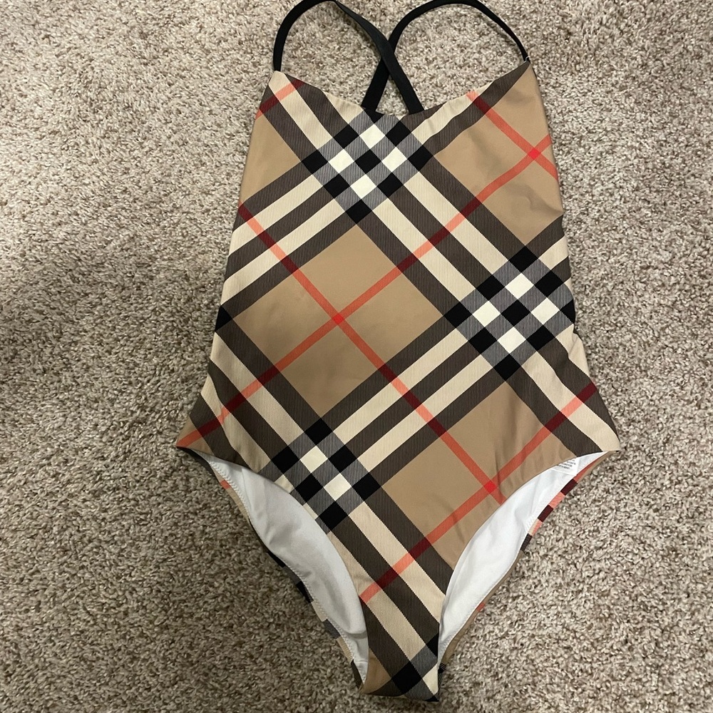 Burberry Swim szM fits tight will suck you in/contour you.